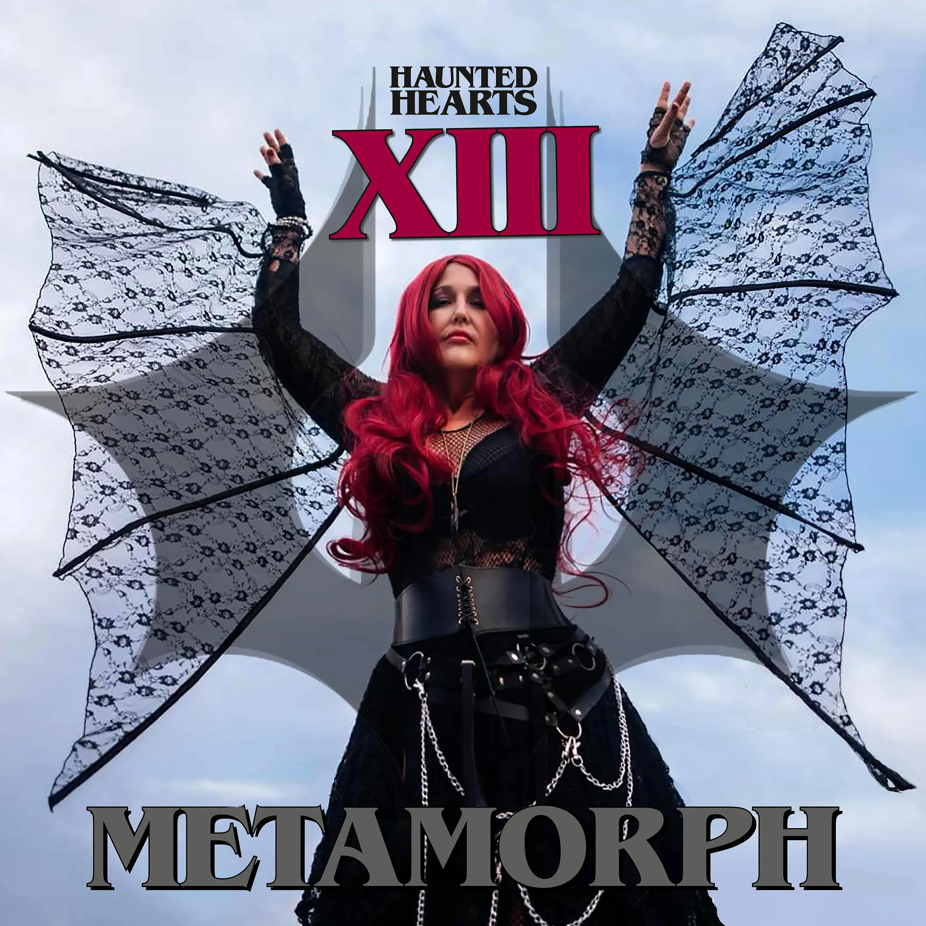 A person with long red hair and lace wings poses in gothic attire under a cloudy sky. The text reads "Haunted Hearts XIII," the latest album from Metamorph.