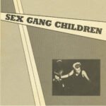 Album cover for Sex Gang Children’s "Live At The Lyceum 1983," featuring the text "SEX GANG CHILDREN" and a small black-and-white photo of a spiked-hair performer on stage—perfect for any album review.