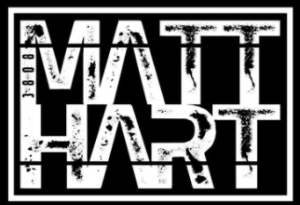 Black and white graphic with the distressed, bold text "MATT HART" in all caps. Numbers "3608" are vertically aligned to the left of the letter "A".